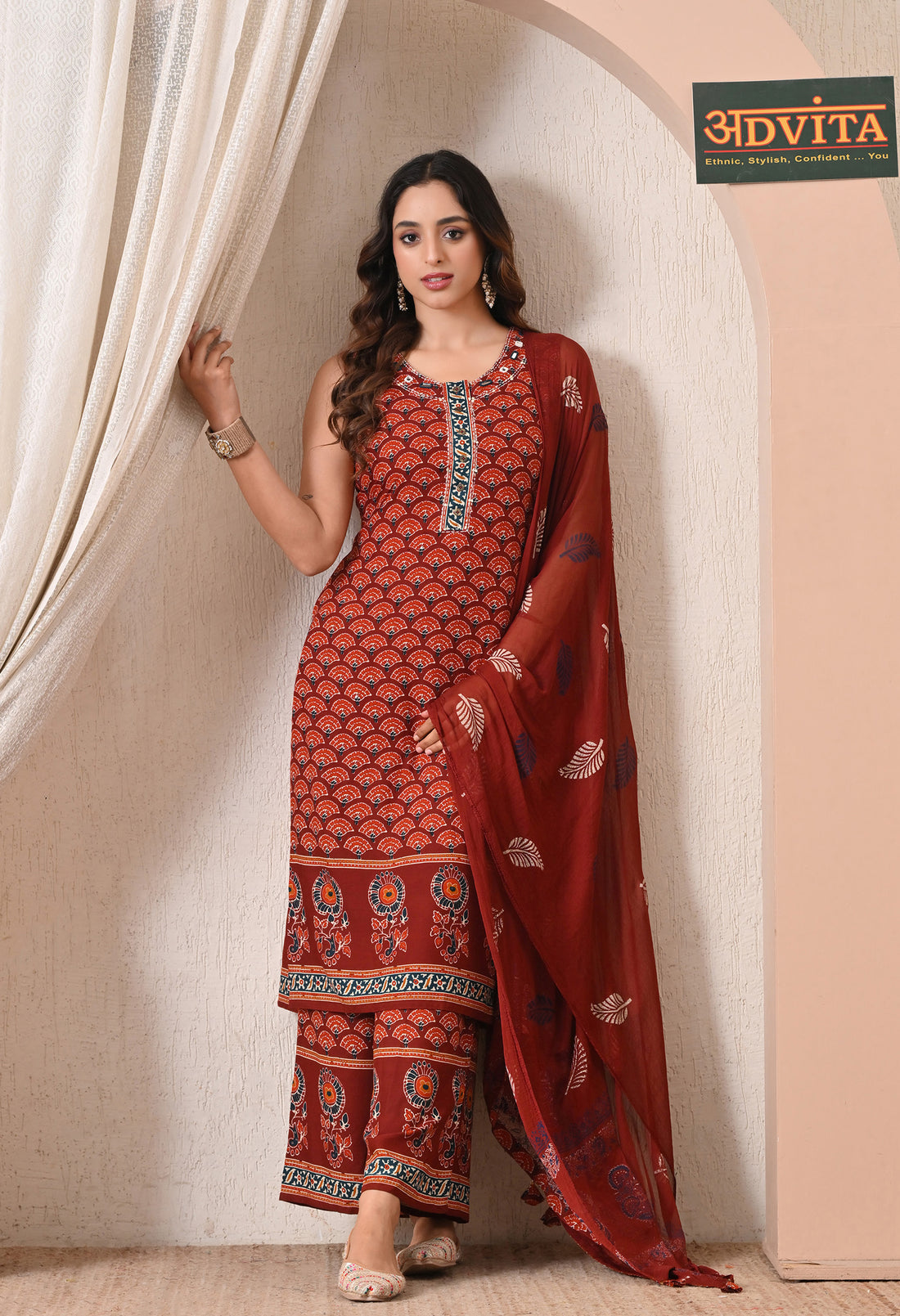 Woman wearing Advita Maroon Fan Print Rayon Cotton 3-Piece Palazzo Suit