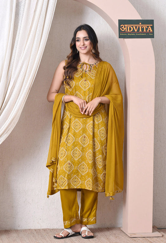 Woman wearing Advita Mustard Bandhani Print Gaji Silk 3-Piece Suit