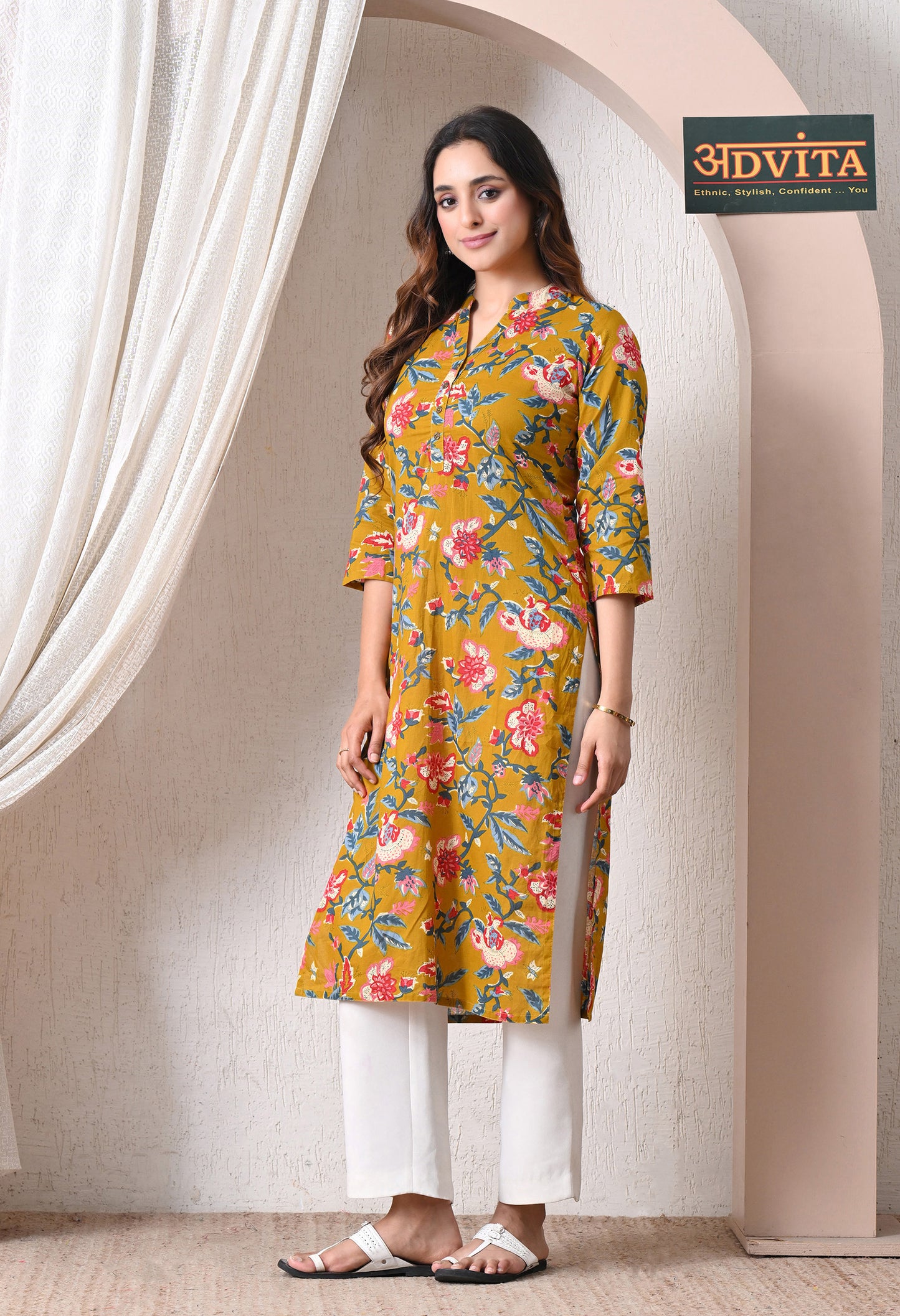 Woman wearing Advita Mustard Floral Print Cotton Kurti