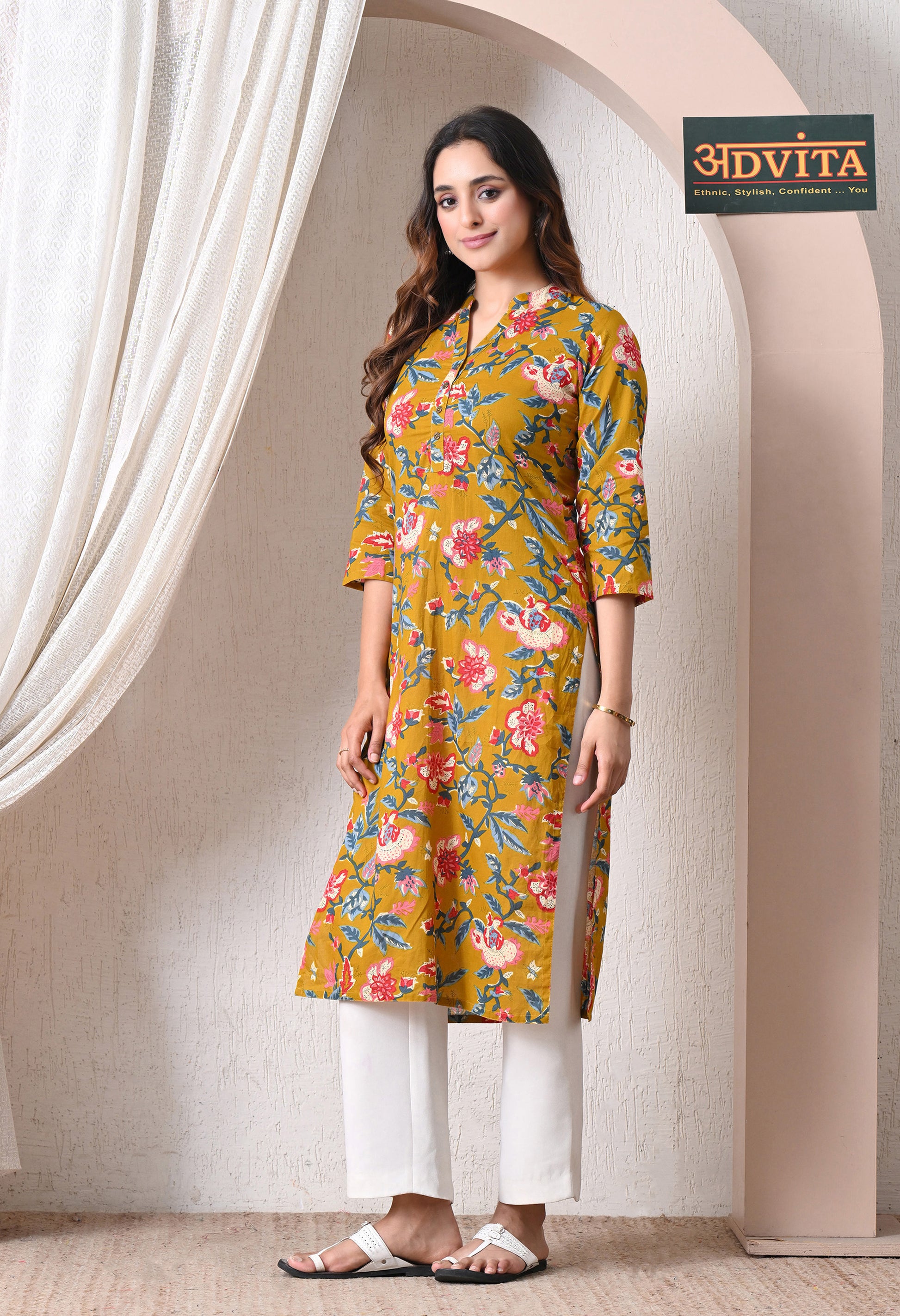 Woman wearing Advita Mustard Floral Print Cotton Kurti