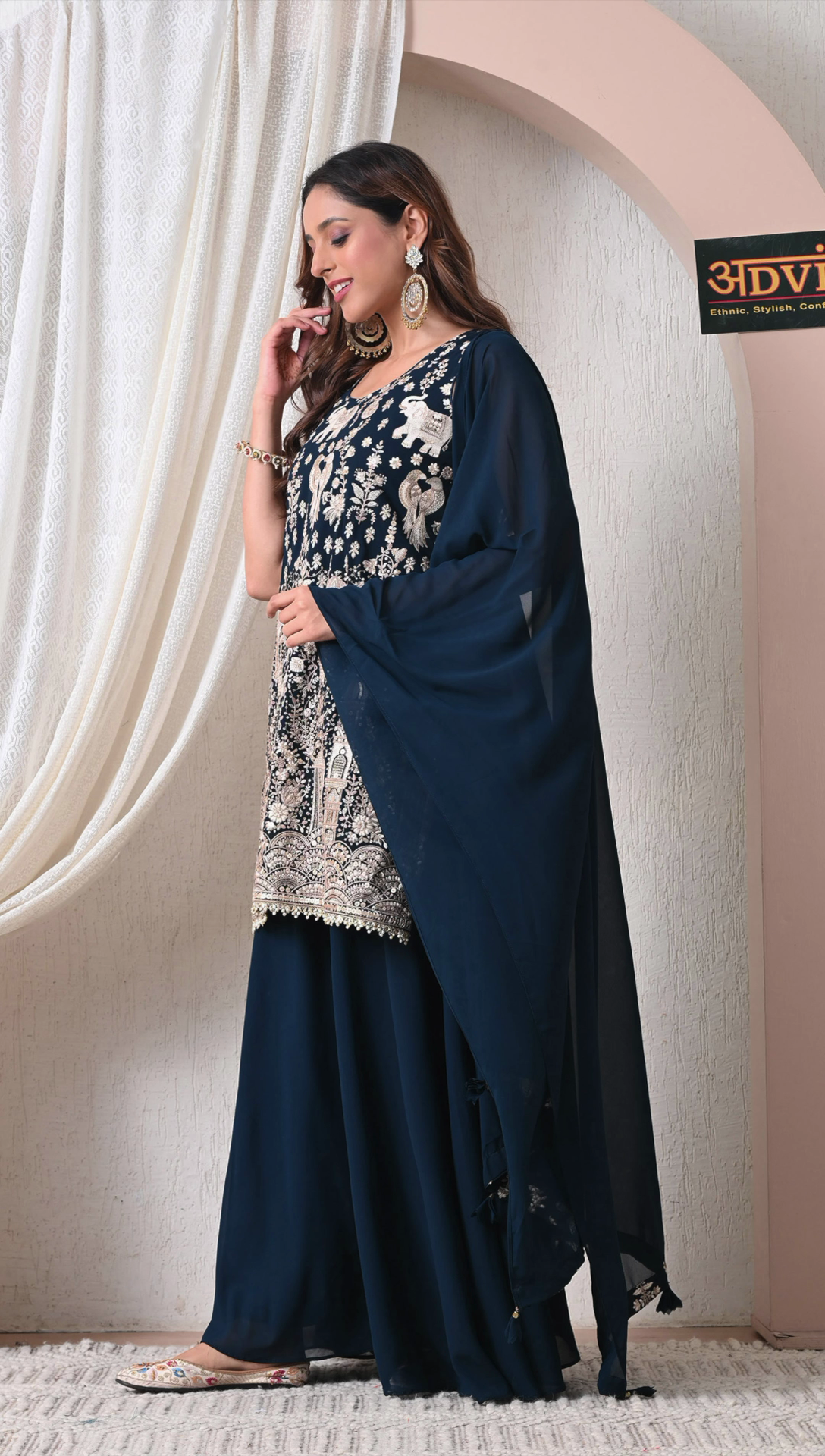 Side view of navy blue party wear sharara suit with dupatta