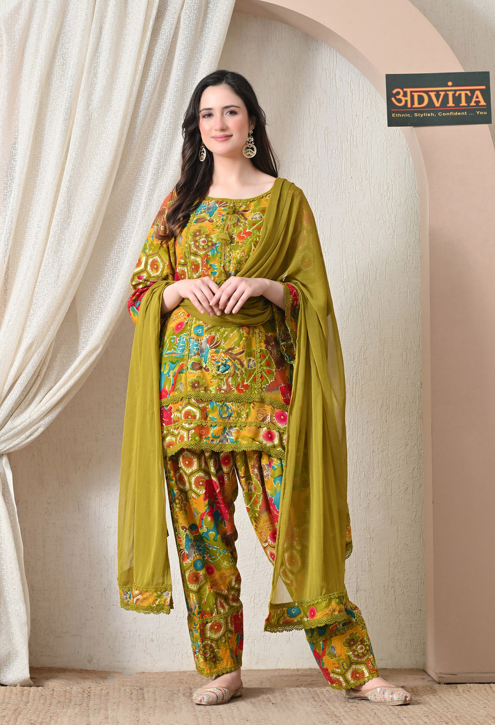 Woman wearing Advita Olive Green Multicolor Floral Print Rayon Cotton Farsi Salwar Suit