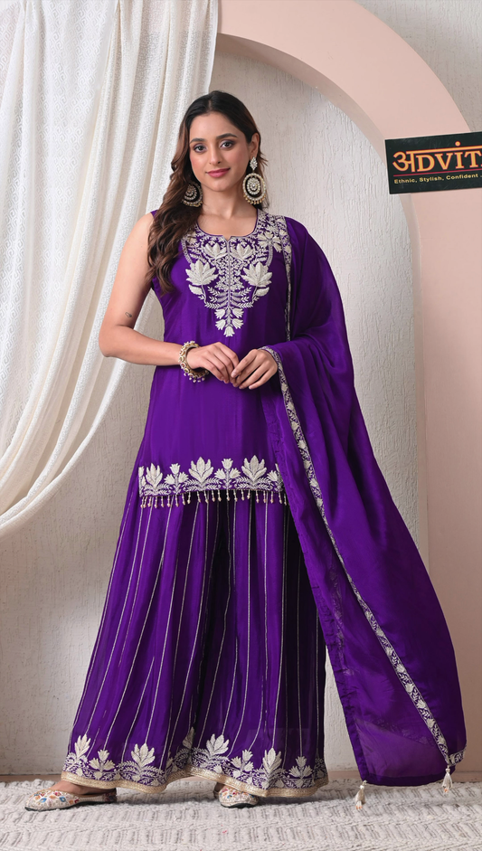 Woman wearing royal purple chinon embroidered sharara set with dupatta